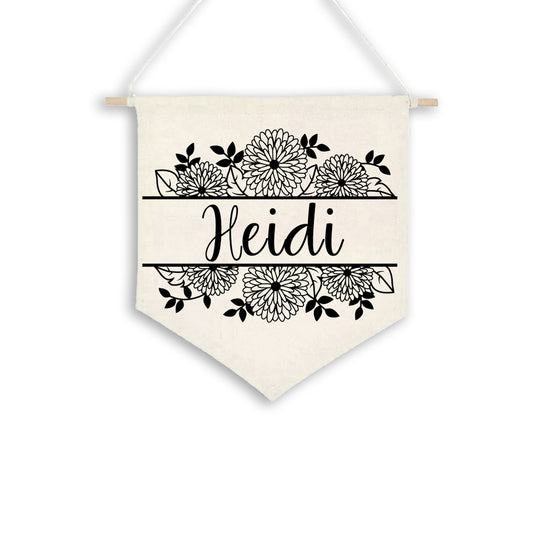 Birth Flower Name Flag made of natural white cotton, featuring the name 'Heidi' with the January birth flower, carnations. The flag is shown against a plain background.