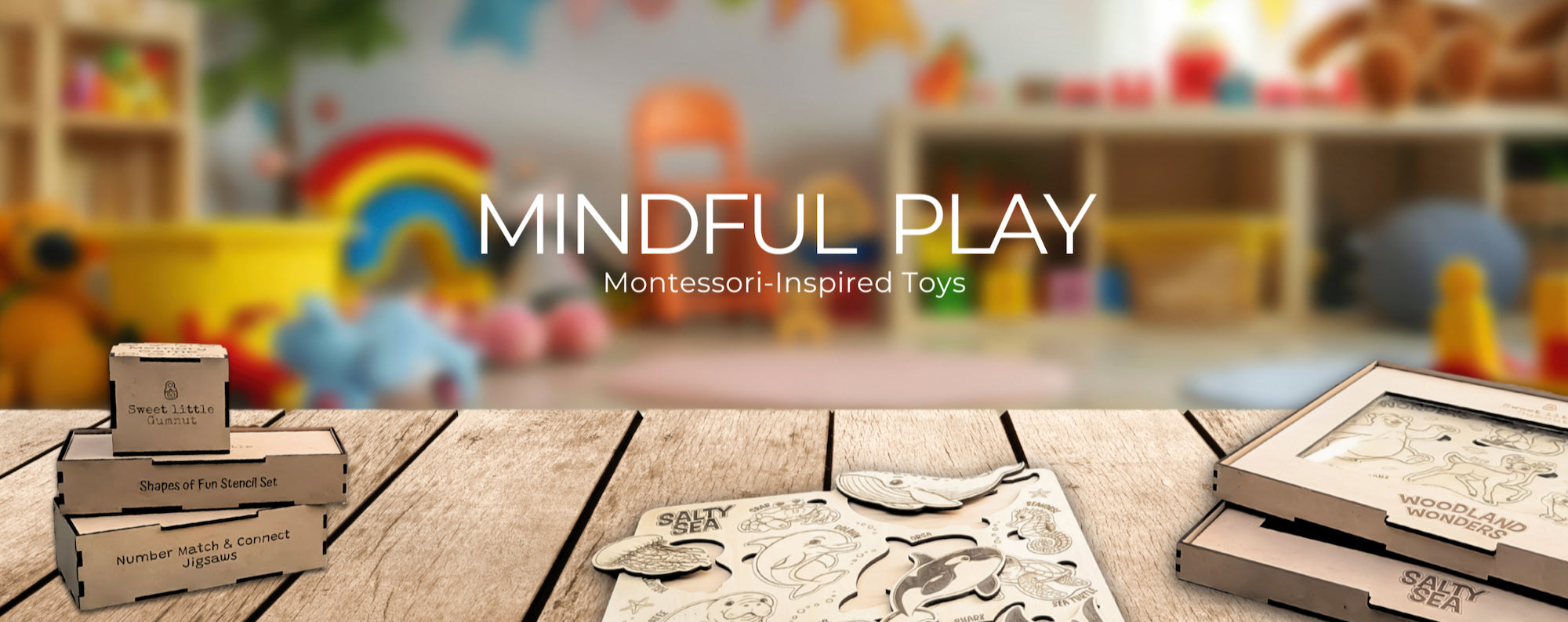 Banner for Mindful Play Collection - A vibrant banner showcasing the text "Mindful Play - Montessori Toys." In the foreground, a wooden table displays an assortment of toys, including a memory game, an animal puzzle, and tracing stencils. The background features a blurred view of colorful play room with furniture and various toys, creating a lively and playful atmosphere.