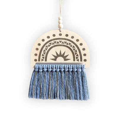 Semi-circle wooden sign with an engraved rainbow design and denim blue and gold tassels, displayed on a plain background.