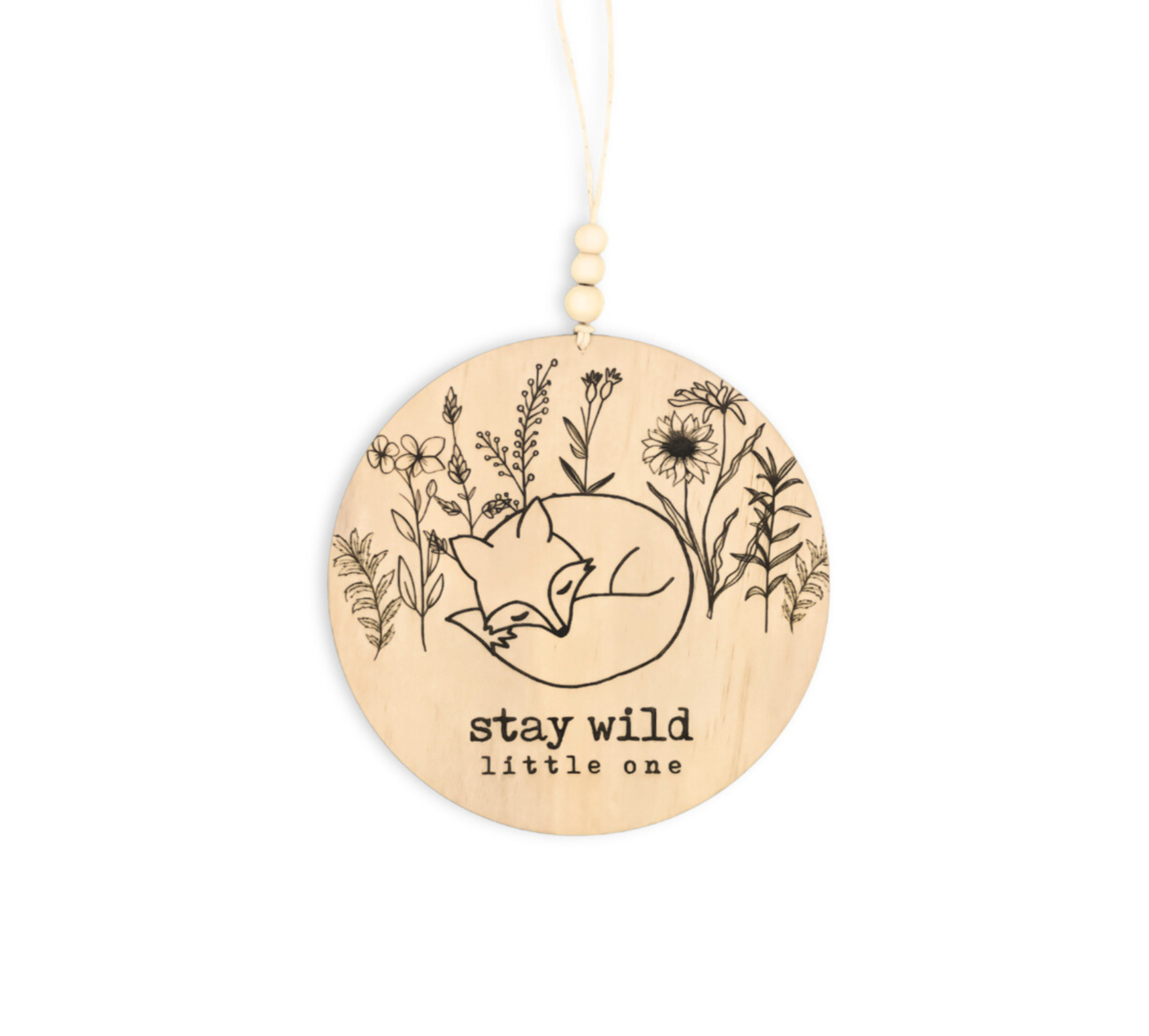 Full view of a wooden sign engraved with 'Stay Wild Little One,' featuring a sleeping fox and wildflower designs, perfect for inspiring a sense of adventure in a child's room